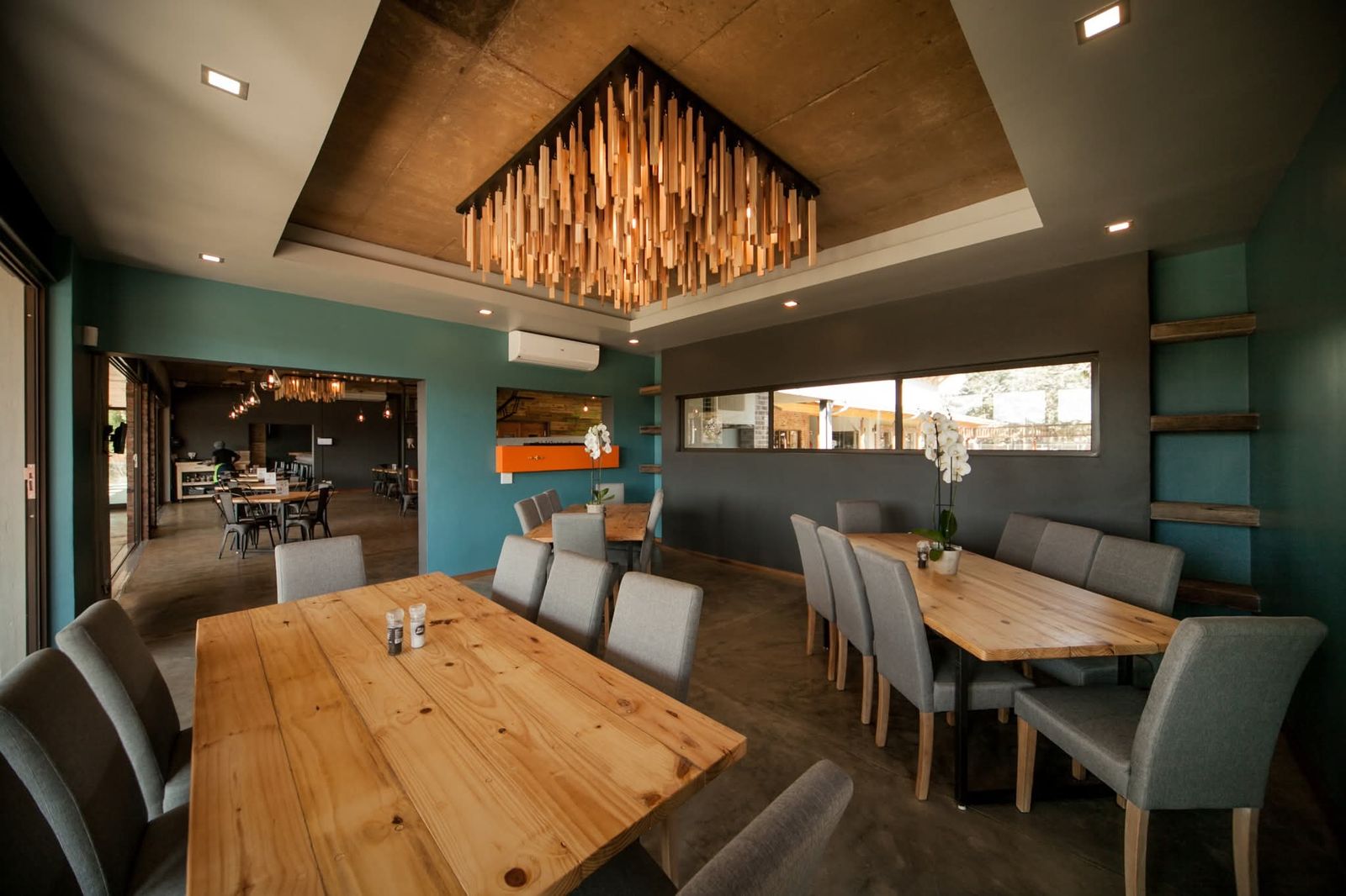 Dining room with a timber chandelier